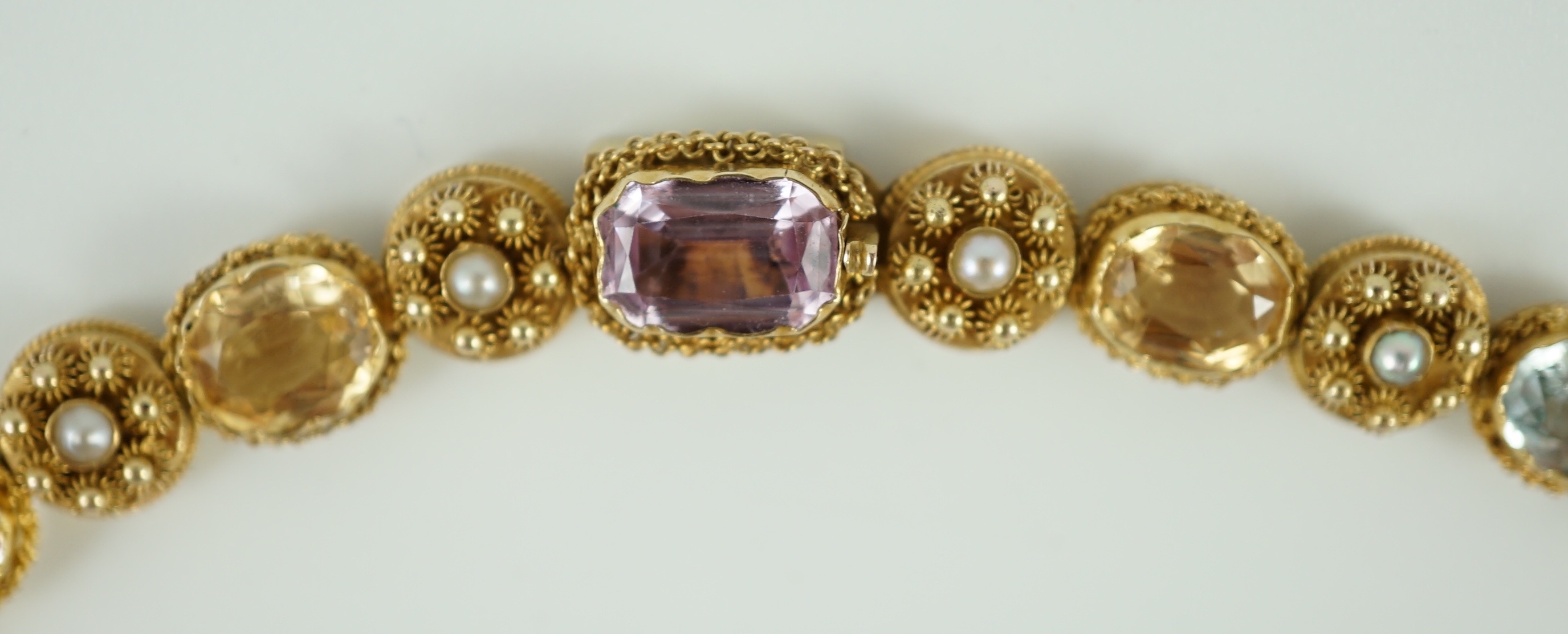 A 19th century gold, pink topaz, seed pearl, citrine and aquamarine set choker necklace